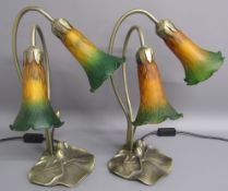 Pair of Tiffany style lily pad table lamps with green and orange glass shades