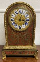 19th century French boulle mantel clock with ormolu mounts and gilded face engraved with makers name