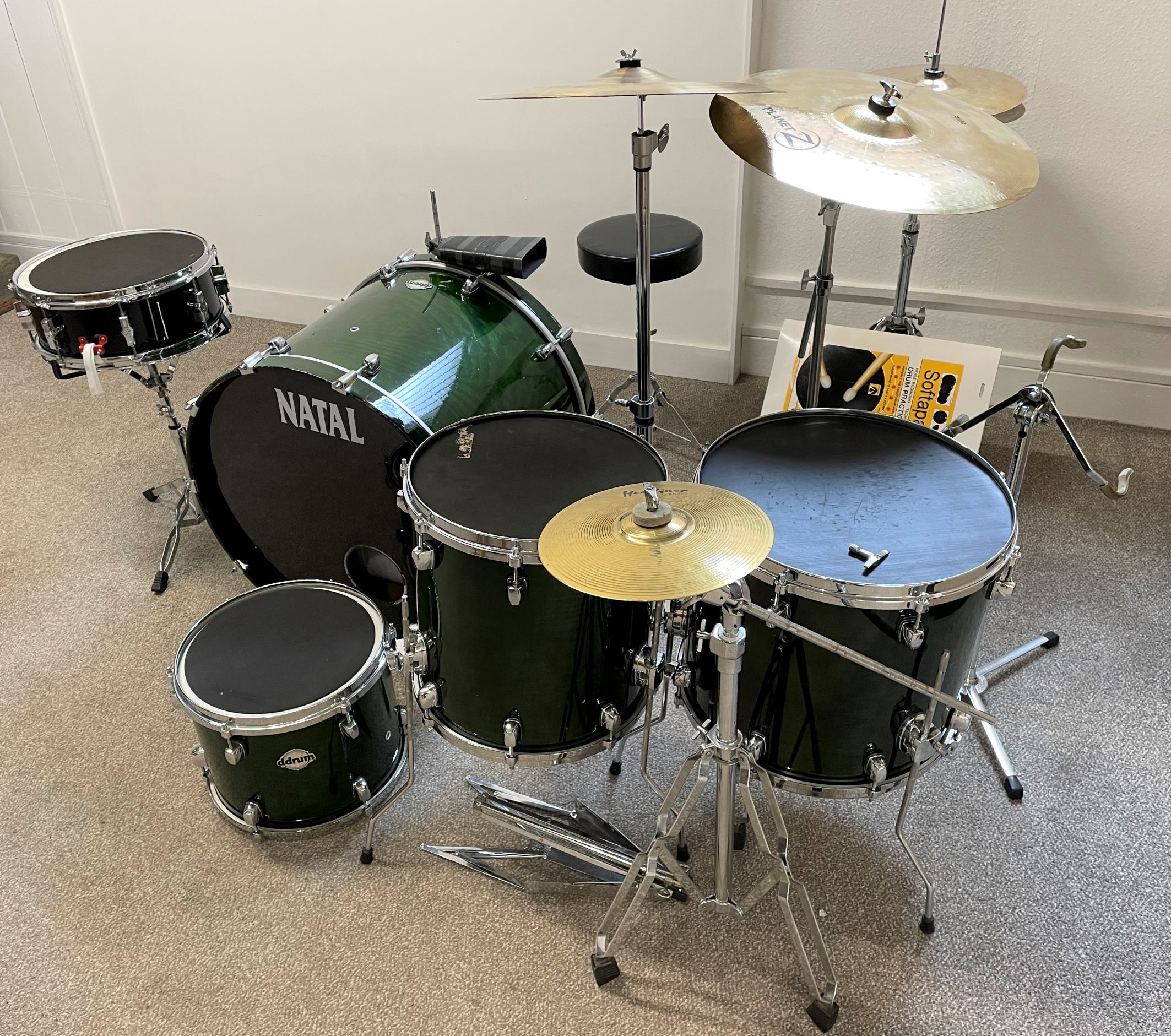 Natal drum kit comprising ride cymbal, floor tom tom x 2, small tom tom, floor base drum with pedal,