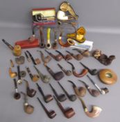 Large collection of pipes includes some silver mounted, Peacemaker plumb, Dunhill, Petersons, Polo