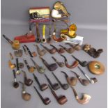 Large collection of pipes includes some silver mounted, Peacemaker plumb, Dunhill, Petersons, Polo