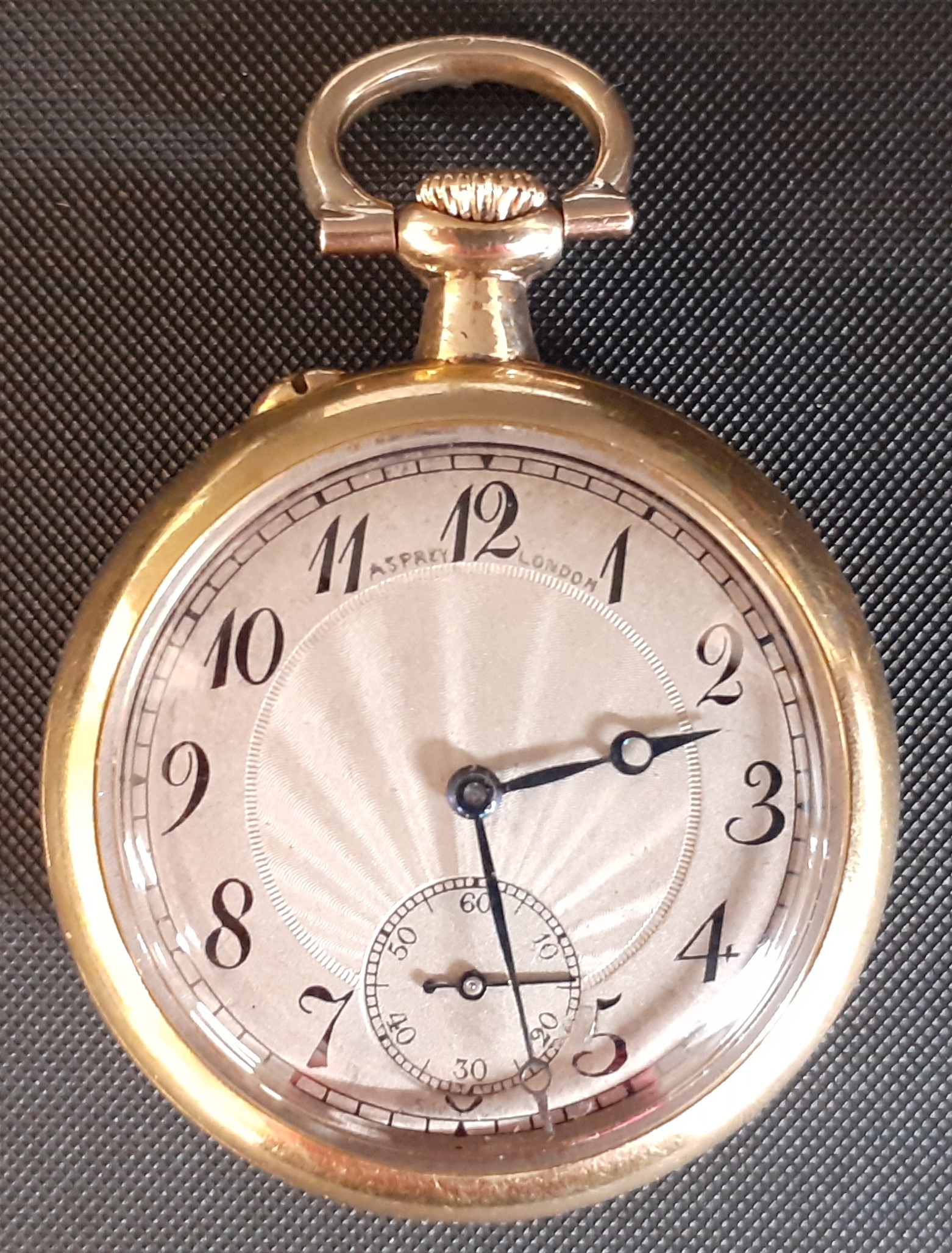18k gold fob watch with subsidiary seconds dial, engine turned face, with believed to be later