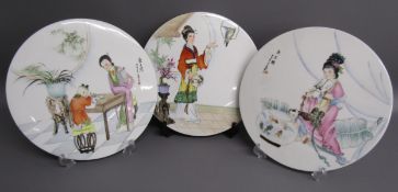 3 Chinese porcelain circular plaques - approx. 26cm dia.