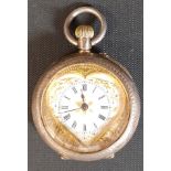 Continental silver gilt top wind fob watch marked 935 with engine turned case, heart shaped