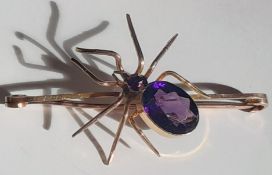 9ct gold & purple glass spider brooch, 7.10g, 6.5cm wide
