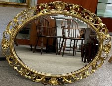 Wall mirror with ornate gilt rococo frame 94cm by 74cm