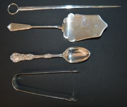 Silver meat skewer J B Chatterley & Sons, Birmingham 1928, pair of silver sugar bows London 1831,