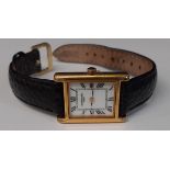 Ladies 18k gold plated Raymond Weil Geneve tank quartz wristwatch on black leather strap, no. 5766/2