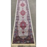 Ivory ground runner with floral medallion design 300cm by 80cm