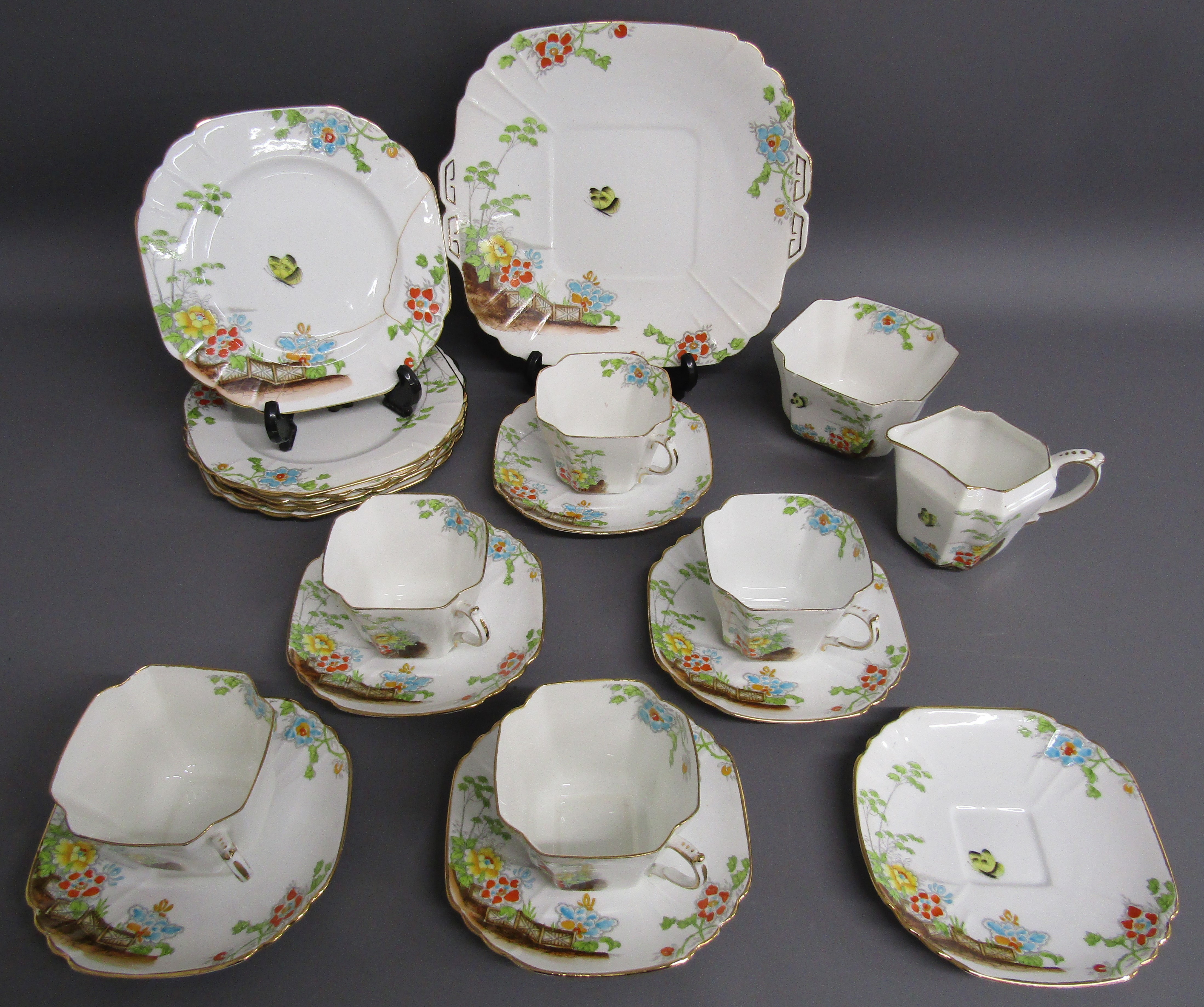 Victoria C & E bone China teacups, saucers, cake plates, side plates (one repaired), sugar bowl