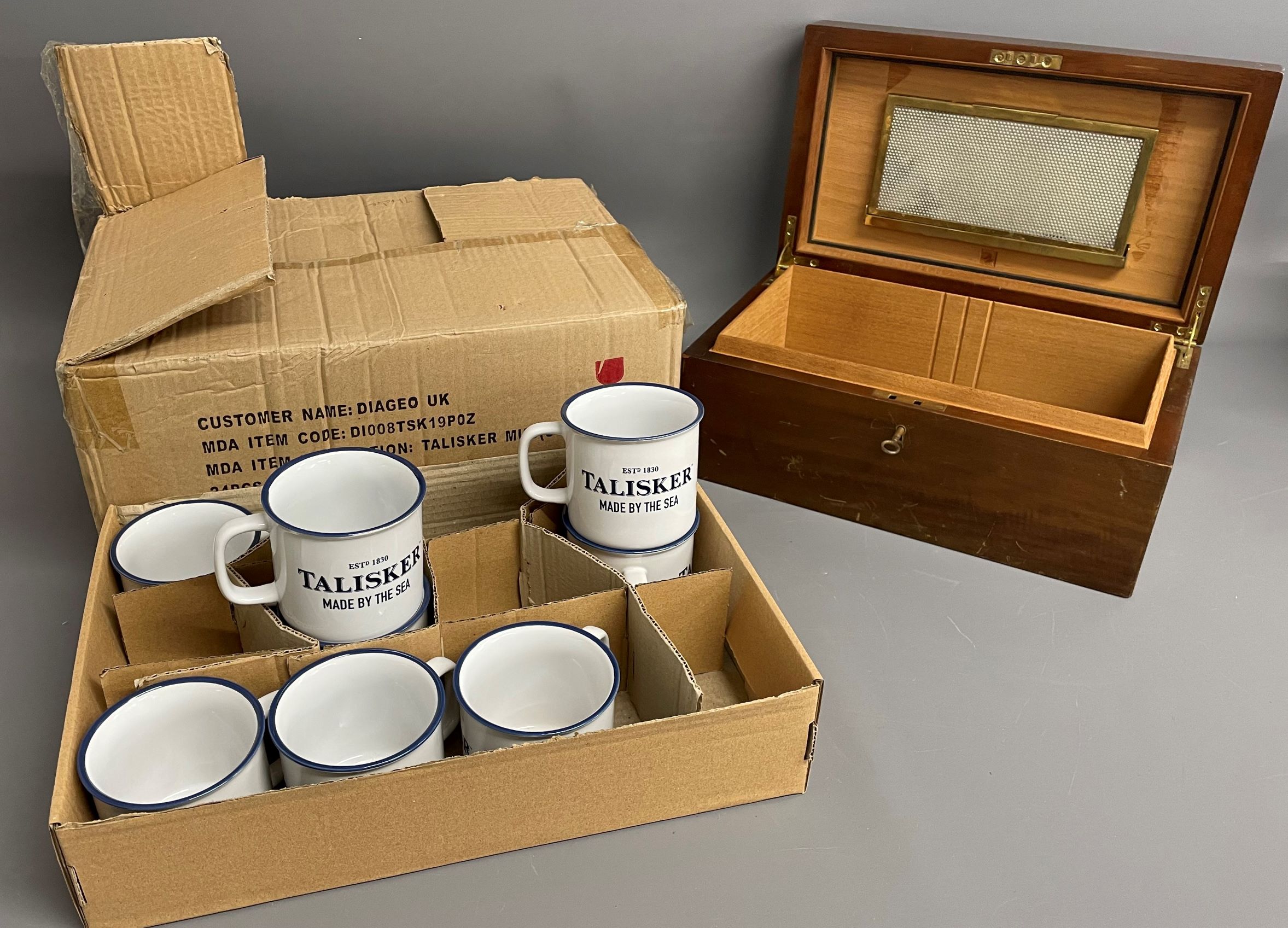 20 Talisker whisky ceramic mugs (unused) & a cigar conditioning box