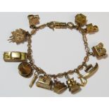 9ct gold charm bracelet - all charms appear hallmarked apart from 'Old Mother Hubbards Boot',