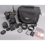 Nikon D70 camera with Nikon Nikkor 70-300mm lens, Sigma 18-12mm lens, 2 batteries, chargers and