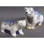 Royal Crown Derby Polar bear & polar bear cub standing paperweights - both with gold stoppers