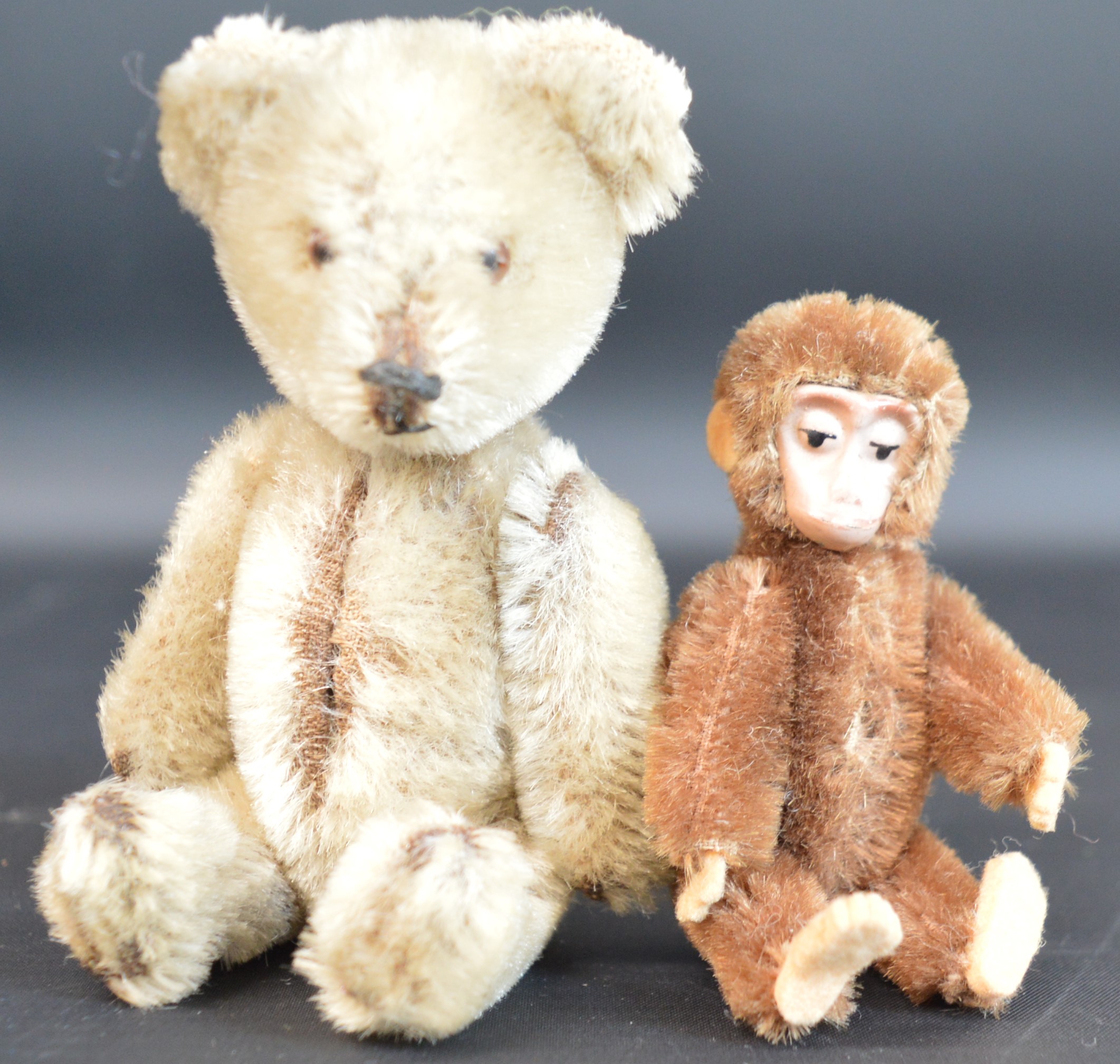 Attributed to Schuco miniature "Yes No" mohair Teddy Bear 13cm high & monkey 9cm high (possibly
