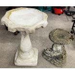 Two concrete bird baths