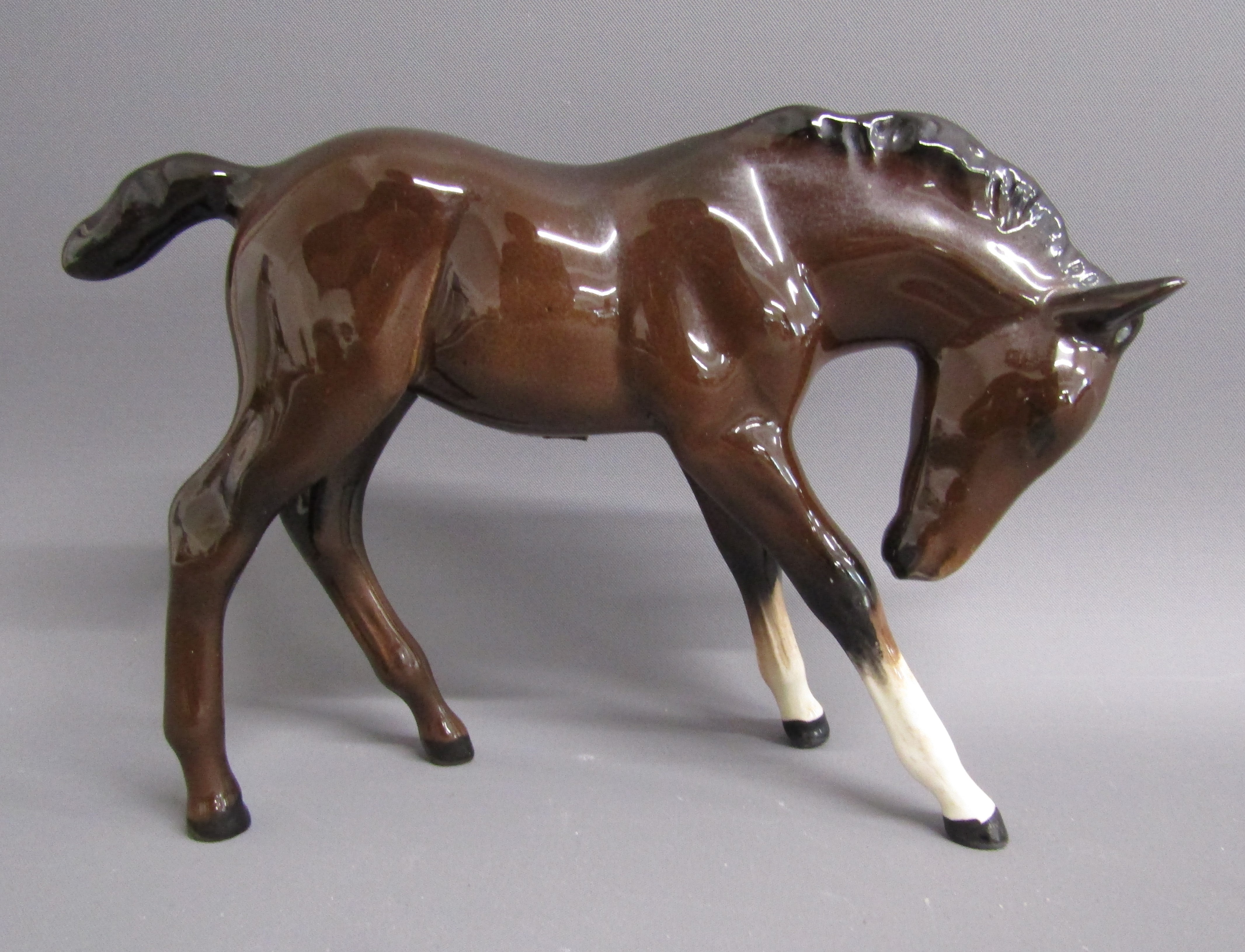 4 Beswick horses - 1549 prancing stallion, 947 foal head down and 2 946 palomino foals with head - Image 4 of 7