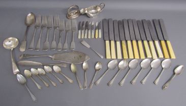 Collection of silver plate, includes knives, forks, teaspoons, sauce boat, fish slice etc