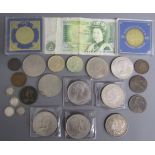 Collection of coins includes £1 note, 1898 United States of America one dollar coin, 2000 Queen