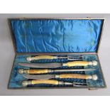 Cased George Butler & Co 'Toledo' 5 piece carving set with horn handle and decorated finials