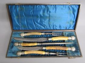 Cased George Butler & Co 'Toledo' 5 piece carving set with horn handle and decorated finials
