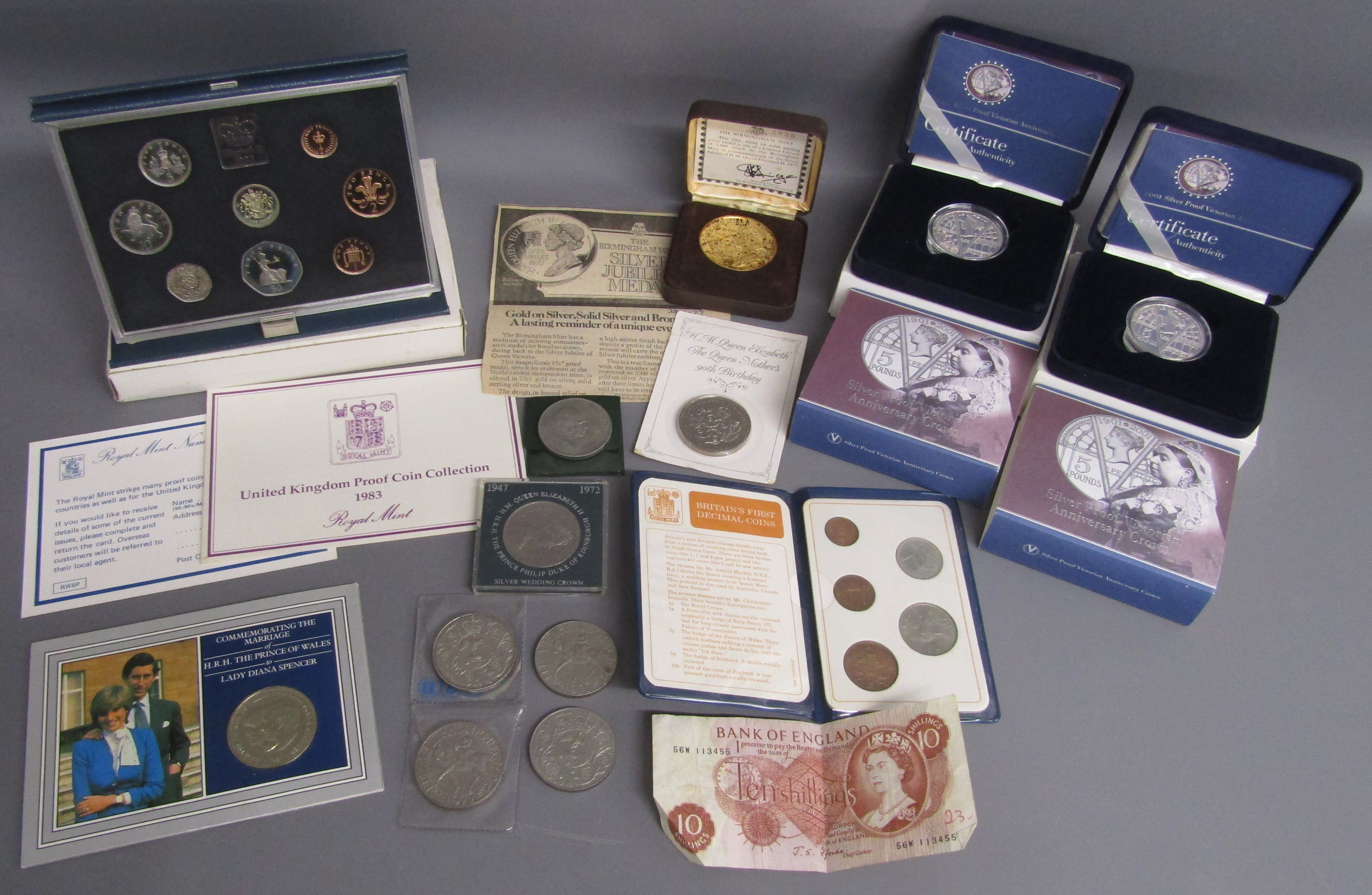 Collection of coins includes 22ct gold on silver medal limited edition 4839/5000, 2 silver proof