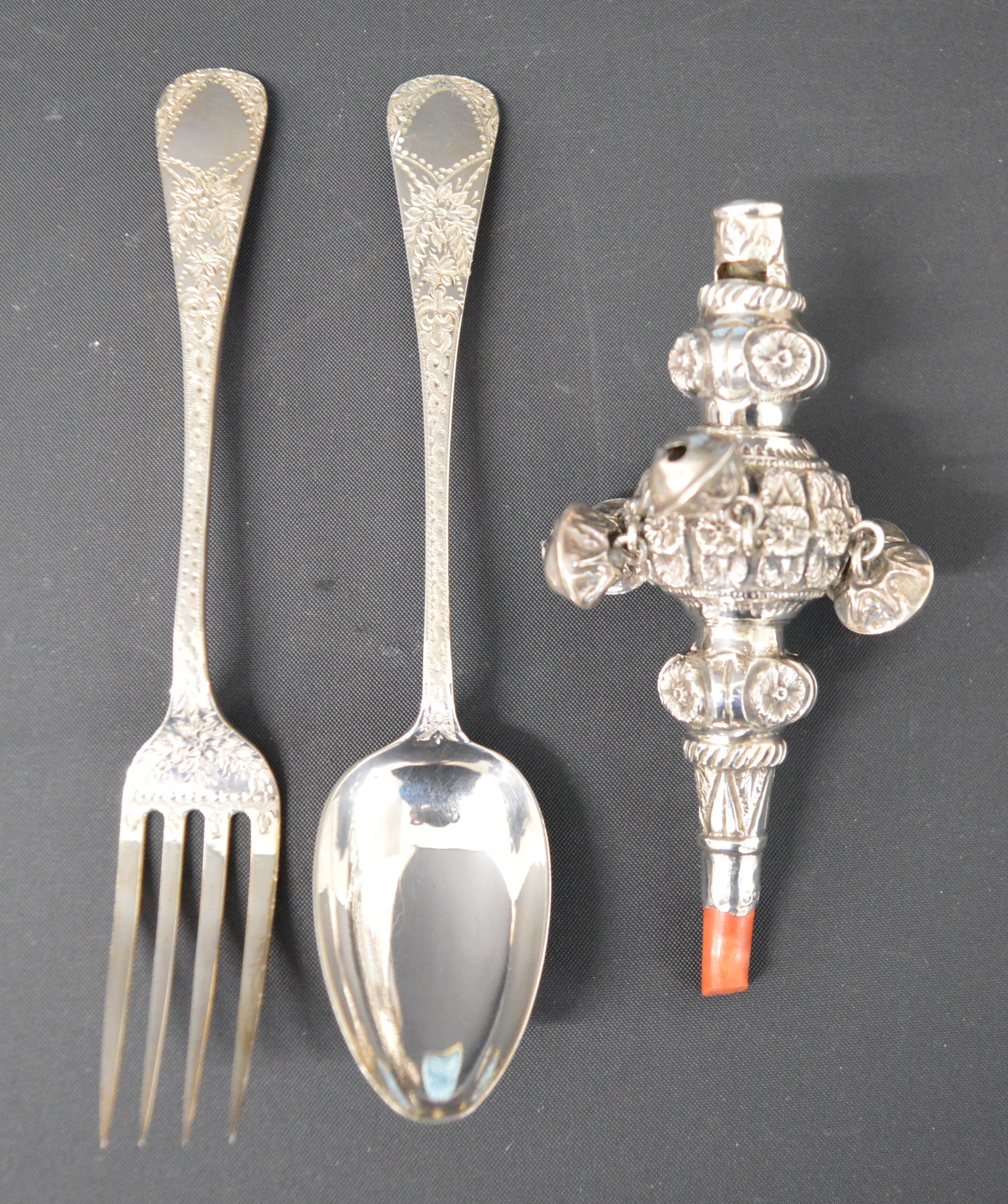 Cased Victorian child's silver rattle, spoon and fork, the cutlery with bright cut engraving and the - Image 3 of 3