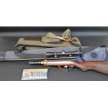 SMK XS79 .22 CO2 powered air rifle with Richter Optik scope, 2 covers & gas canisters