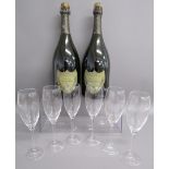 2 Dom Perignon Moet & Chandon sealed display bottles with 6 Dom Perignon Champagne flutes