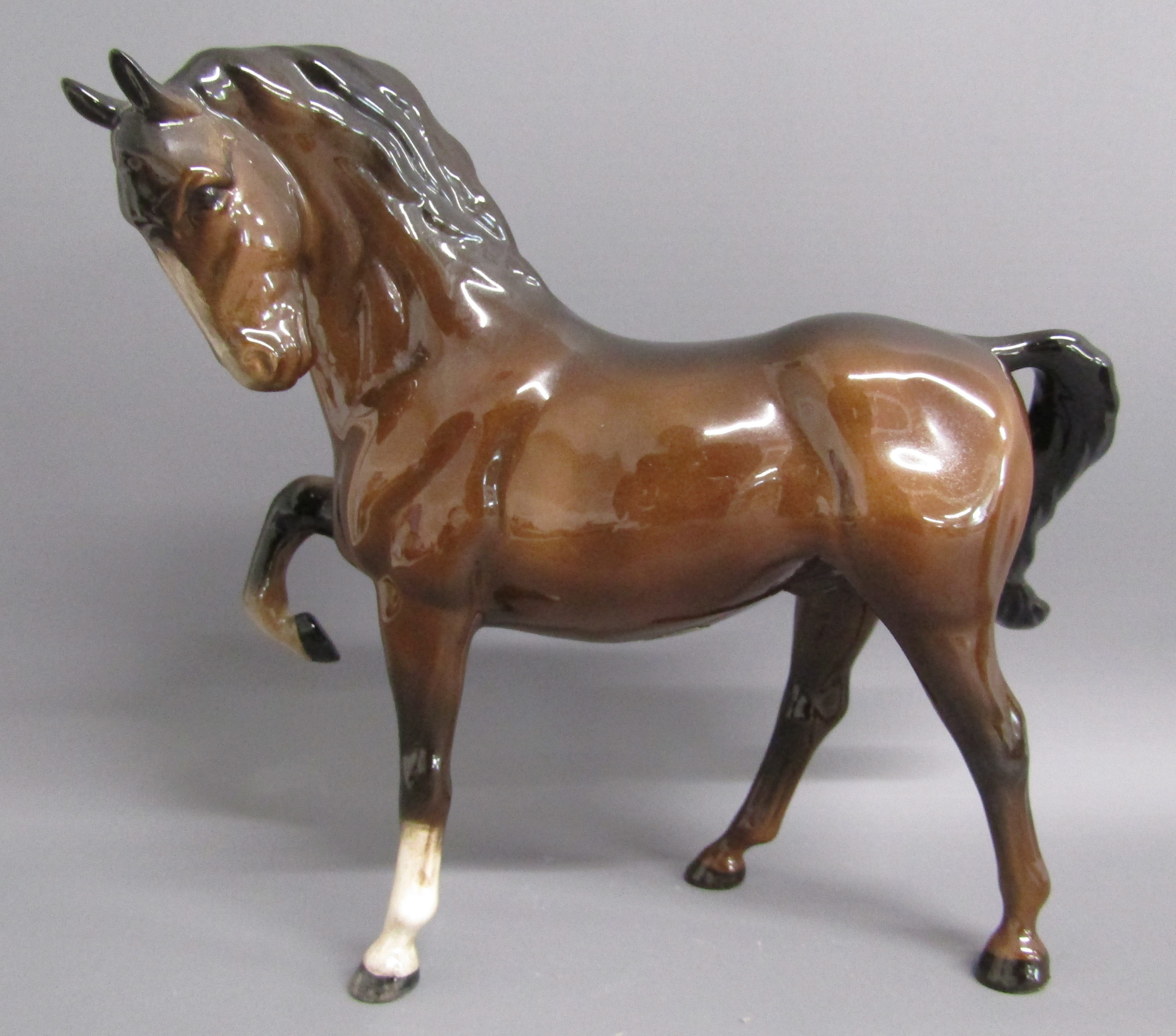 4 Beswick horses - 1549 prancing stallion, 947 foal head down and 2 946 palomino foals with head - Image 3 of 7