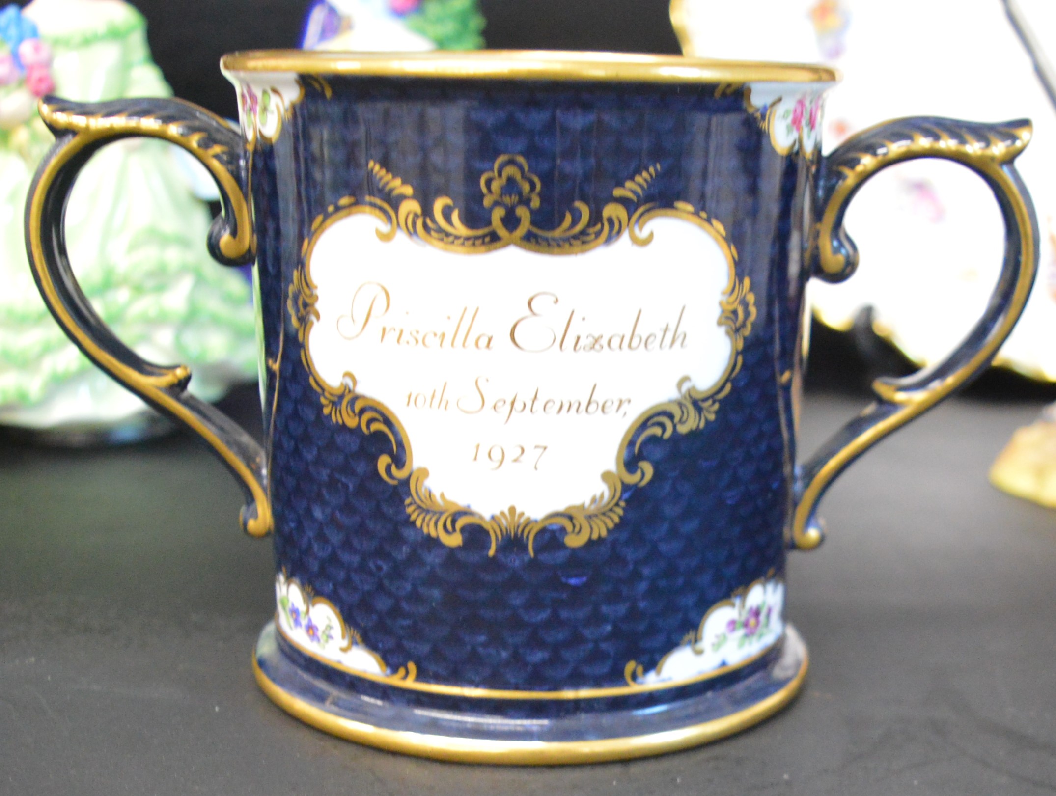 Royal Worcester hand painted loving cup with floral cartouche signed E Philips & dated 1927, 2 Royal - Image 3 of 3