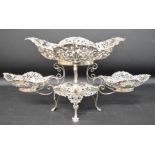 Impressive Victorian/Edwardian silver centrepiece, comprising one large and two smaller fret cut