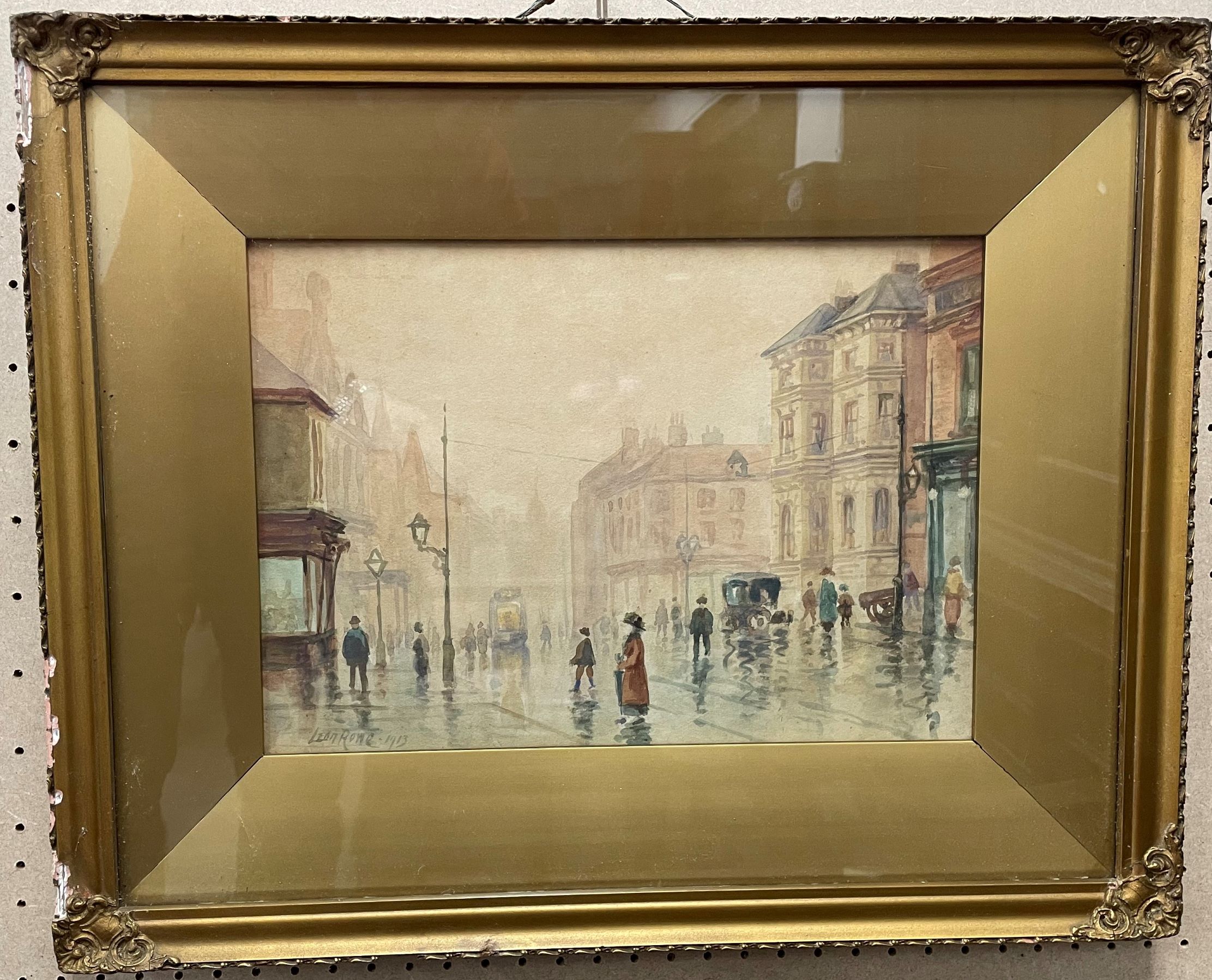 Framed watercolour signed Leon Rowe 1913 of an Edwardian drizzly street scene - Image 2 of 2