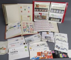 Binder containing approx. 36 Royal Mail Mint Stamps, loose mint stamp sets, stamp albums