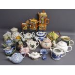 Collection of mostly teapots - includes Arthur Wood, robin teapot that plays jingle bells, Wade,