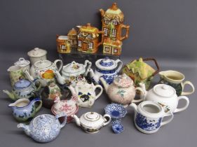 Collection of mostly teapots - includes Arthur Wood, robin teapot that plays jingle bells, Wade,