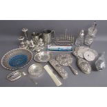 Silver plate includes toast rack, pickle jar with fork, cosmic pickle fork, coasters, glass dish