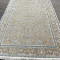 Fine woven Iranian carpet with gold embossed floral pattern 2m by 3m