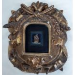 Small micro mosaic tablet set in a black marble slab, in decorative gilt wood frame, 17cm x 21cm