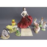 Royal Doulton Winnie the Pooh figures, 'The more it snows, tiddley pom' - 'The Windy Day' - Eeyore
