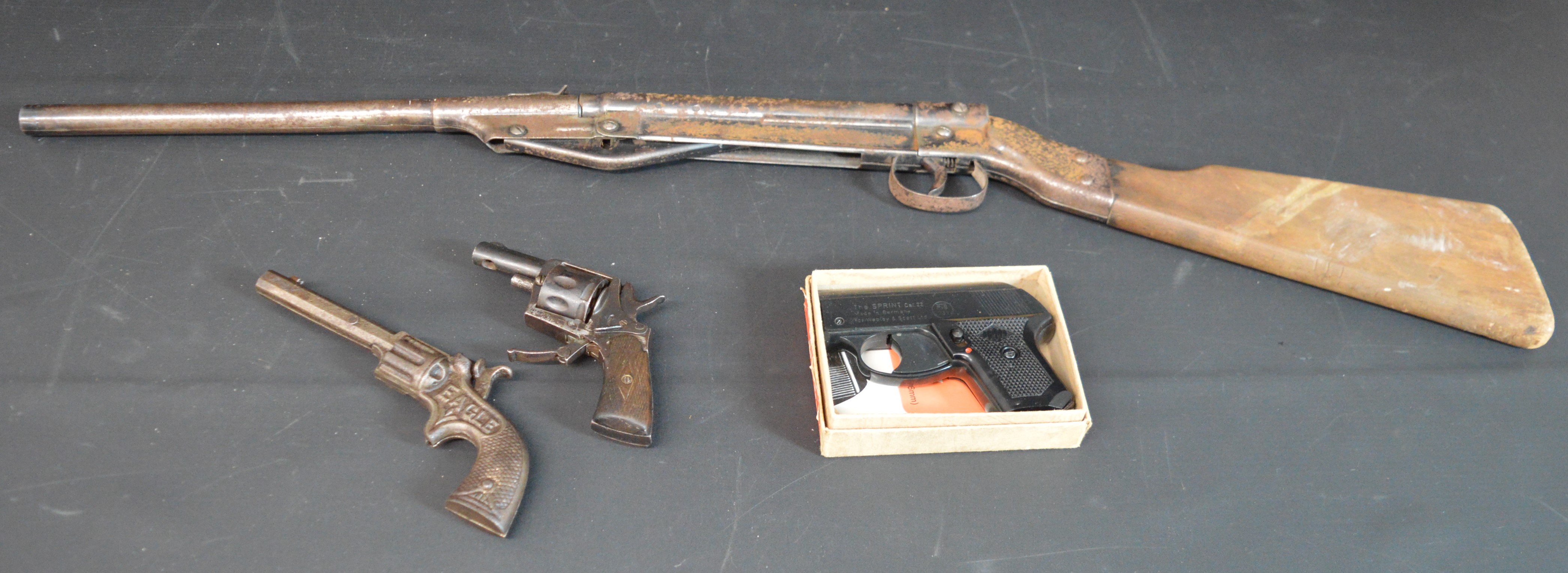 Webley Sprint starting pistol & one other, Eagle cap gun & youth's .177 Diana air gun