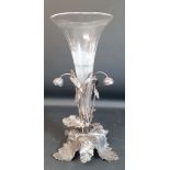 Early 20th century epergne comprising white metal naturalistic stand and clear glass trumpet vase