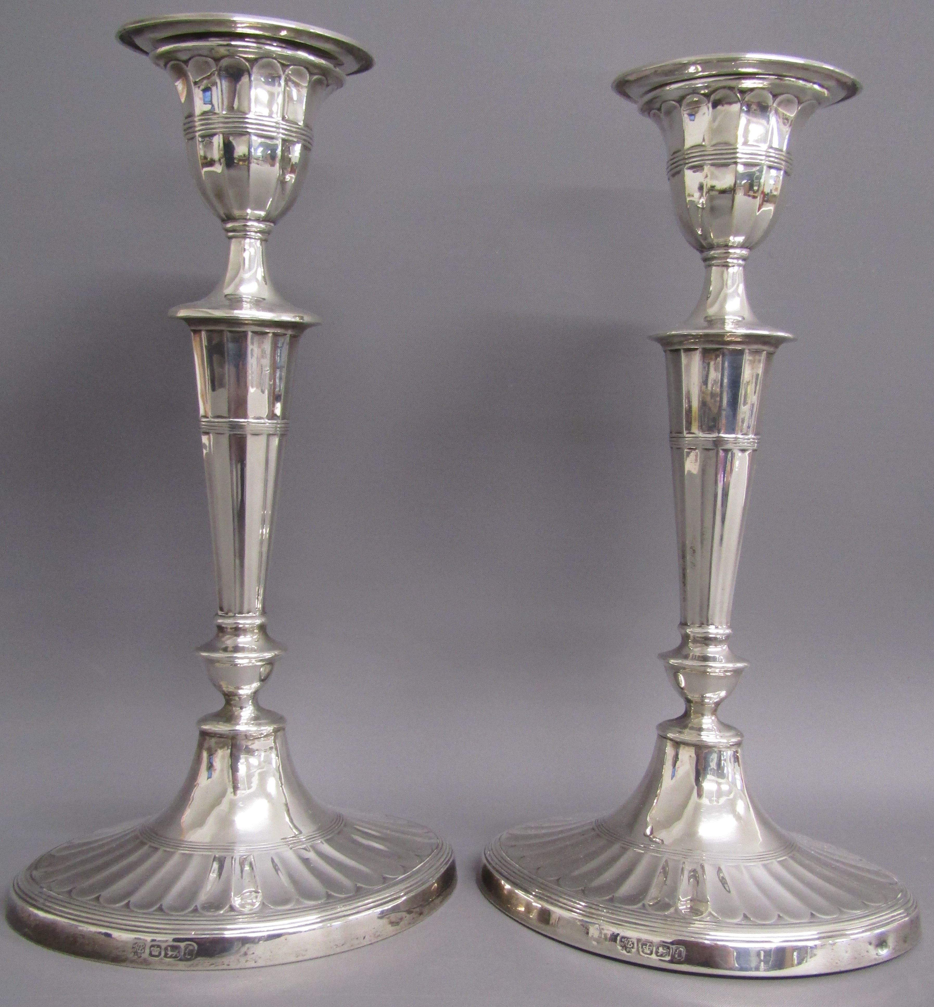 Pair of Hawksworth, Eyre & co, Sheffield 1898 weighted silver candle sticks - approx. 12cm tall