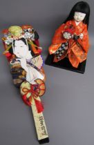 Ichimatsu kimekomi doll on stand and Hagoita paddle