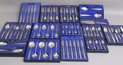 Collection of boxed Oneida 'Venetia' cutlery includes knives, forks, teaspoons, desert spoons,