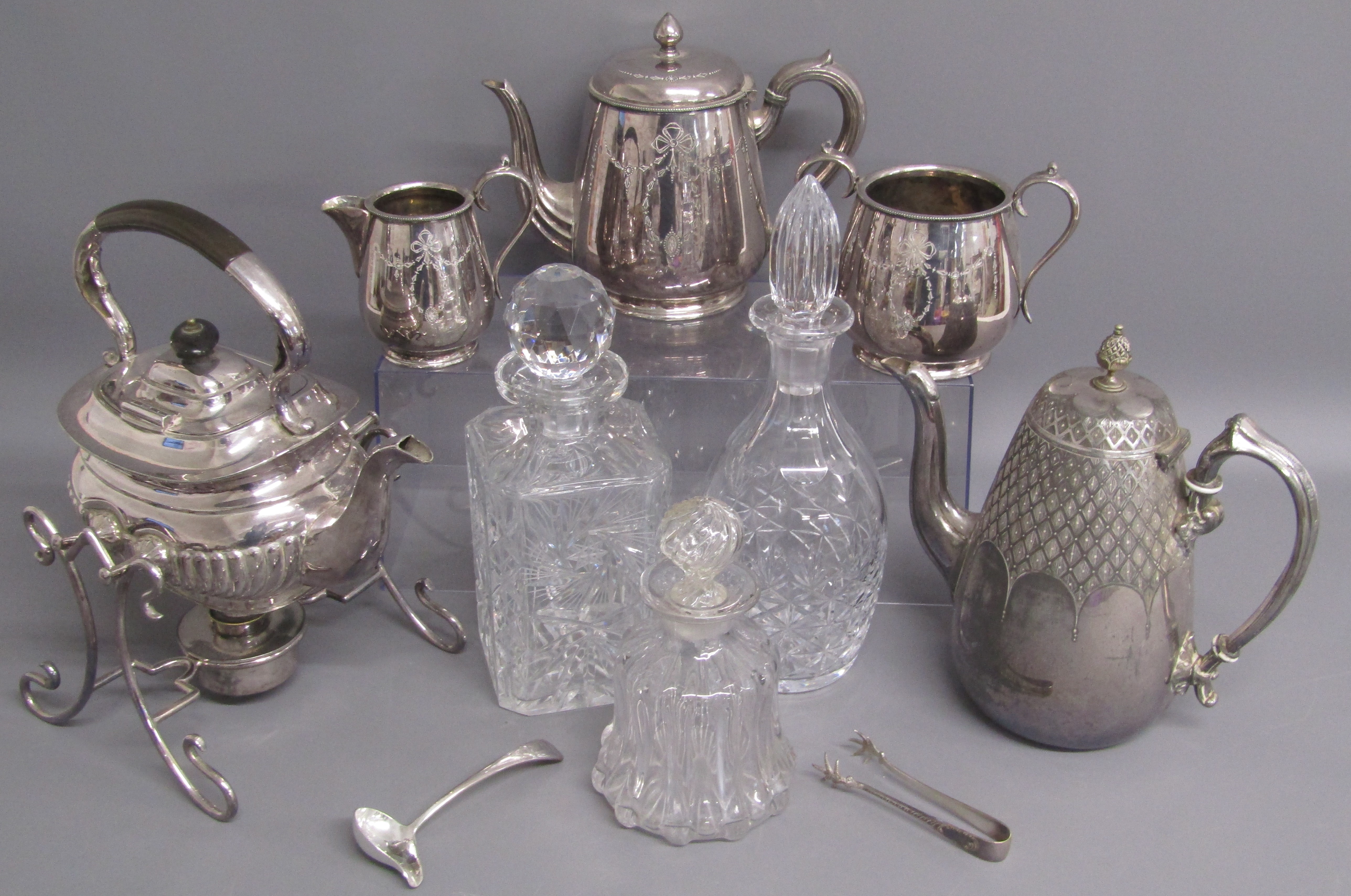 Selection of silver plate and glass including decanters & teapot on stand