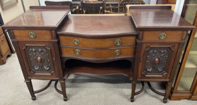 Victorian break bow front sideboard with deeply carved wooden door panels L 184cm D 67cm Ht 105cm