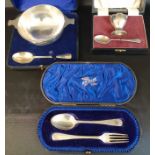 3 cased silver christening sets including quaiche & spoon Walker & Hall Sheffield 1933, egg cup &