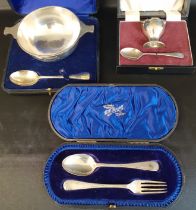 3 cased silver christening sets including quaiche & spoon Walker & Hall Sheffield 1933, egg cup &