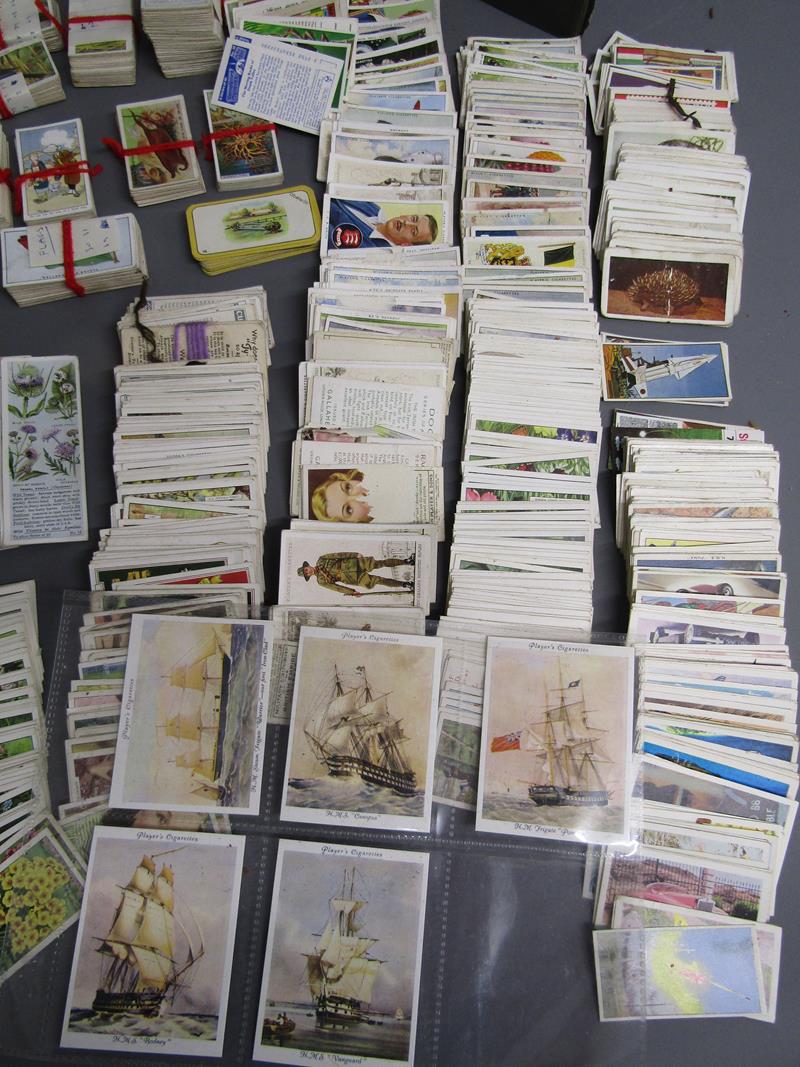 Collection of cigarette cards includes James Bond issued by Somportex Ltd 1-60 taped into book - Image 4 of 21